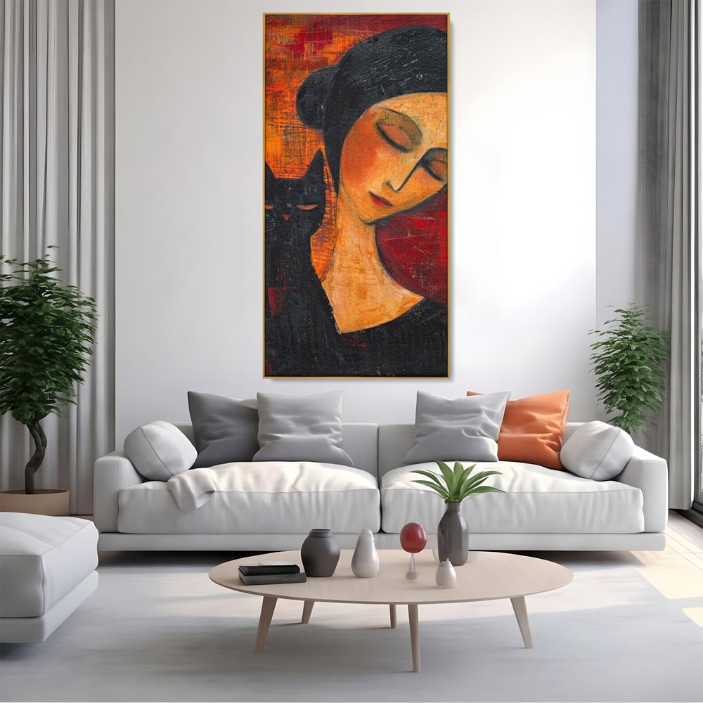Tablou canvas cu pictura cu femeie si pisica neagra, in rama de aluminiu auriu, pe perete intr-un living